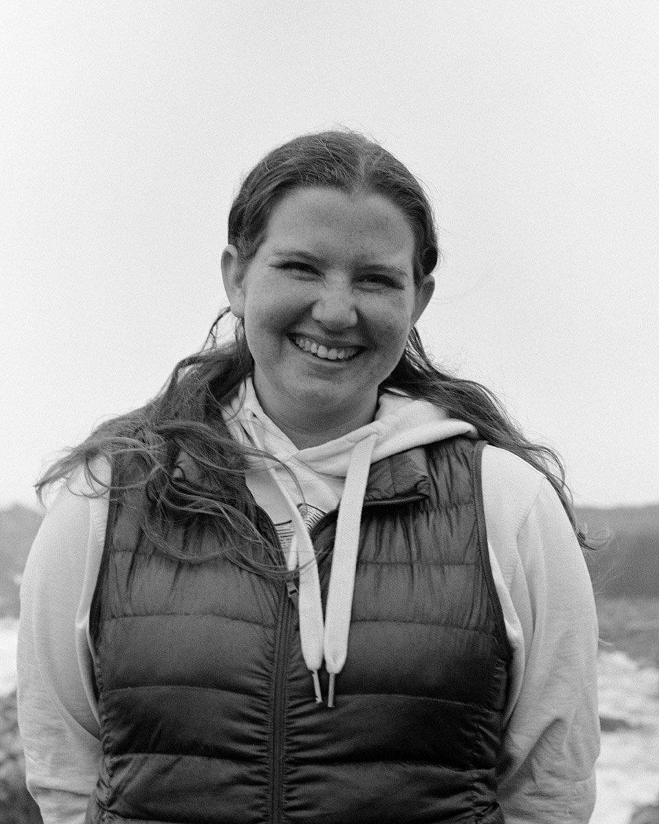 Woman smiling in portrait. Black and white, medium format